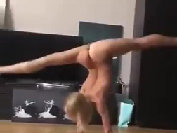 Nude, blonde babe in pink dance shoes with high heels is about to masturbate until she cums