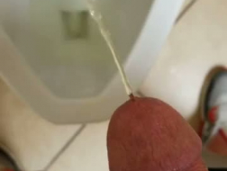 Horny amateur pissing and sucking big cock