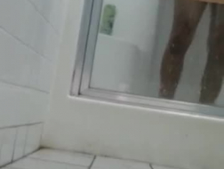 Mature blonde spied on in the toilet
