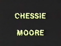 Deetie Moore posing in blue bra