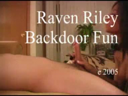 Raven riley is having sex with a guy who has a huge cock, while on the couch.