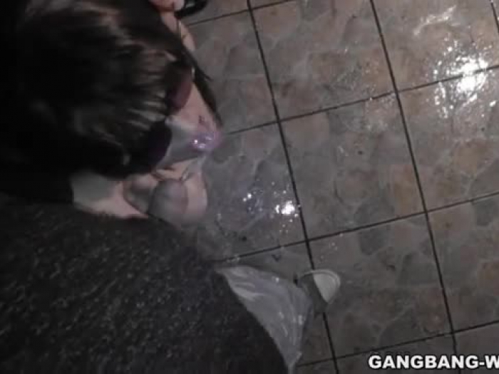 slutwife urinated on by some fellows outdoors