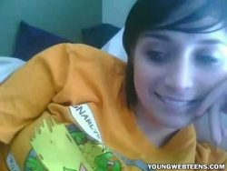 dark-haired teenager frigging herself on web cam