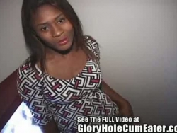 black dame using her tongue ring in the gloryhole