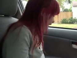 emo teenage thumbs herself in the car